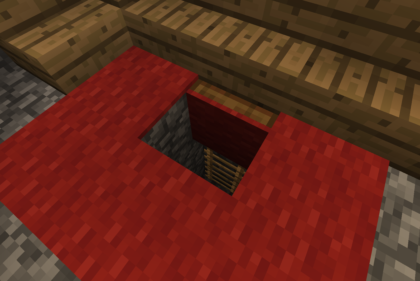 An open carpeted trapdoor, revealing a secret ladder